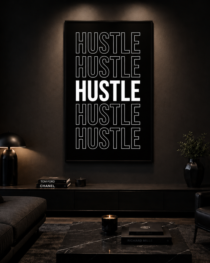 Hustle typography canvas as a statement piece in a dark room
