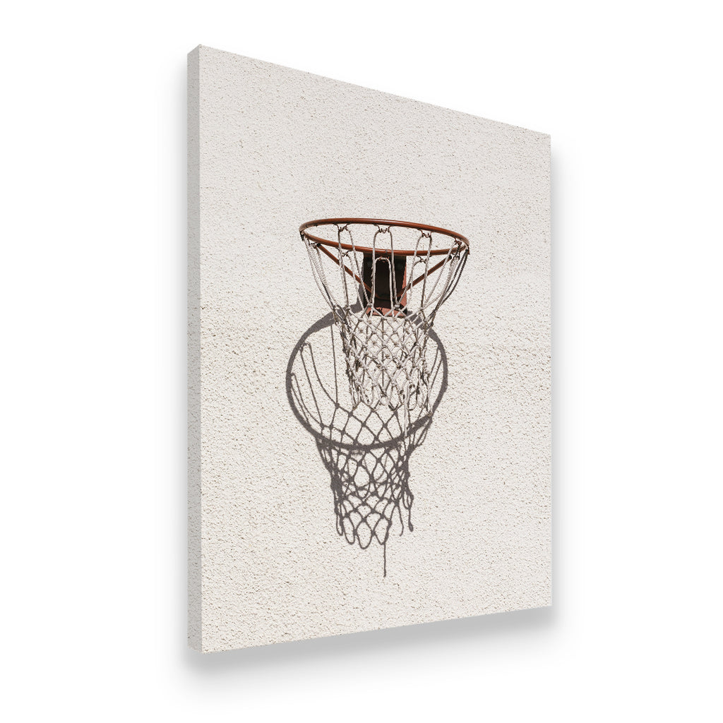 Side-angle view of basketball hoop net shadow canvas print on gallery-wrapped canvas — street court wall art