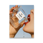 Chanel No. 5 perfume bottle fashion pop art canvas wall art — woman drinking from iconic flacon against blue sky