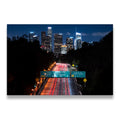 Downtown Los Angeles night freeway canvas wall art with long-exposure light trails and illuminated skyline