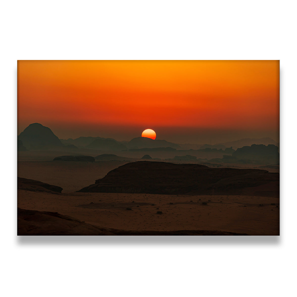Desert sunset canvas wall art with silhouetted rock formations and fiery orange sky at dusk