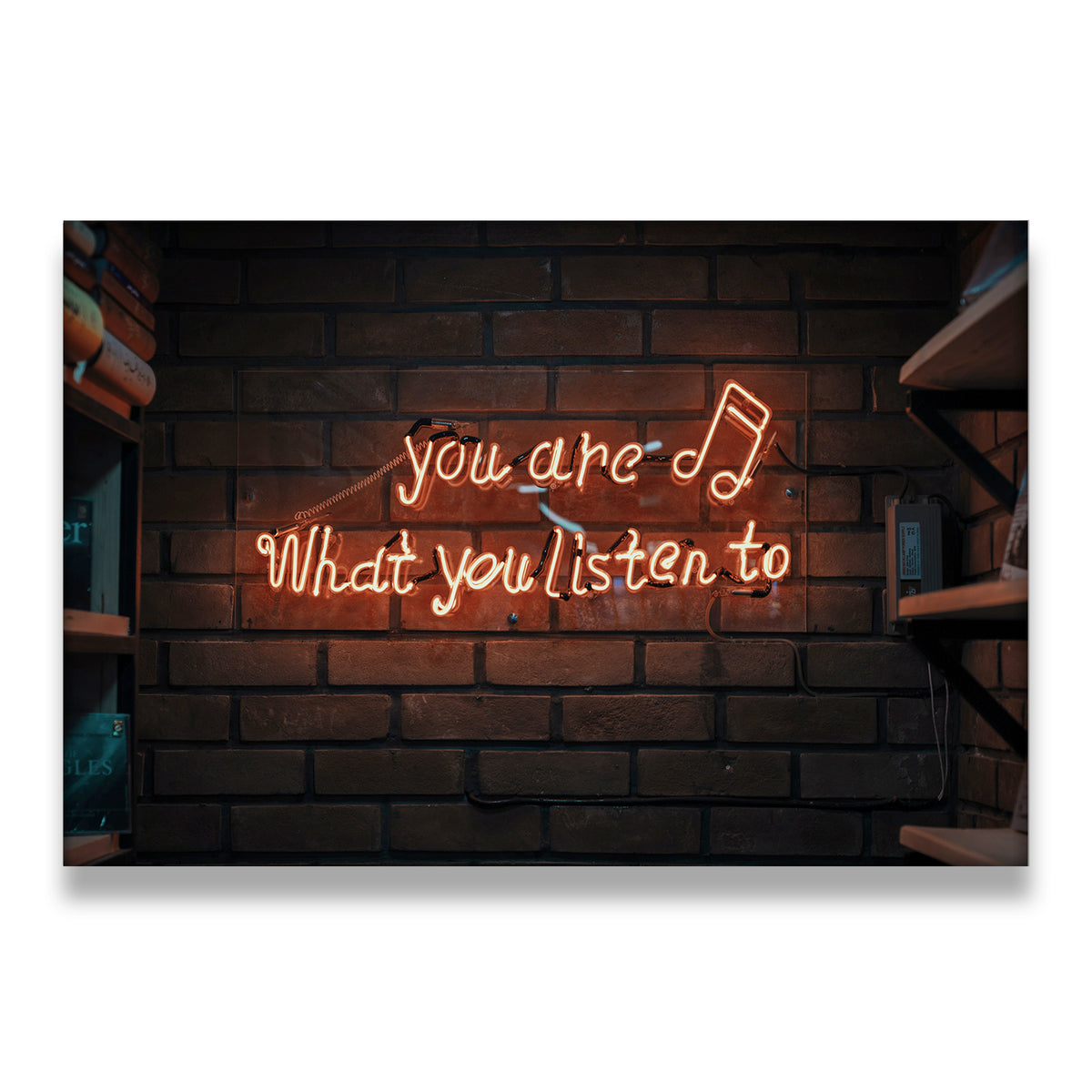 You Are What You Listen To amber neon sign on brick wall canvas wall art — music quote decor