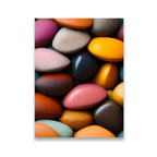 Colorful pebbles close-up canvas wall art print featuring vibrant orange, pink, yellow, and charcoal stones