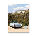 Pale blue classic convertible with DREAMER license plate parked below the Hollywood Sign on a sunny LA hillside — canvas wall art