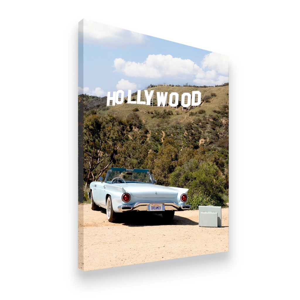 Gallery-wrapped canvas of a vintage Thunderbird-style roadster facing the Hollywood Sign on a dusty California road