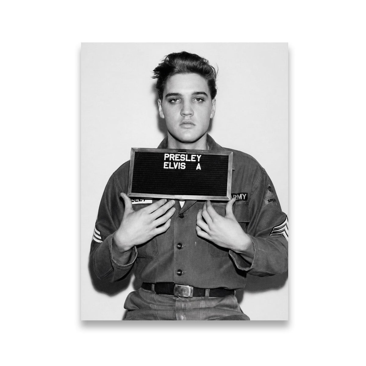 Elvis Presley U.S. Army induction black-and-white portrait canvas wall art, holding PRESLEY ELVIS A placard