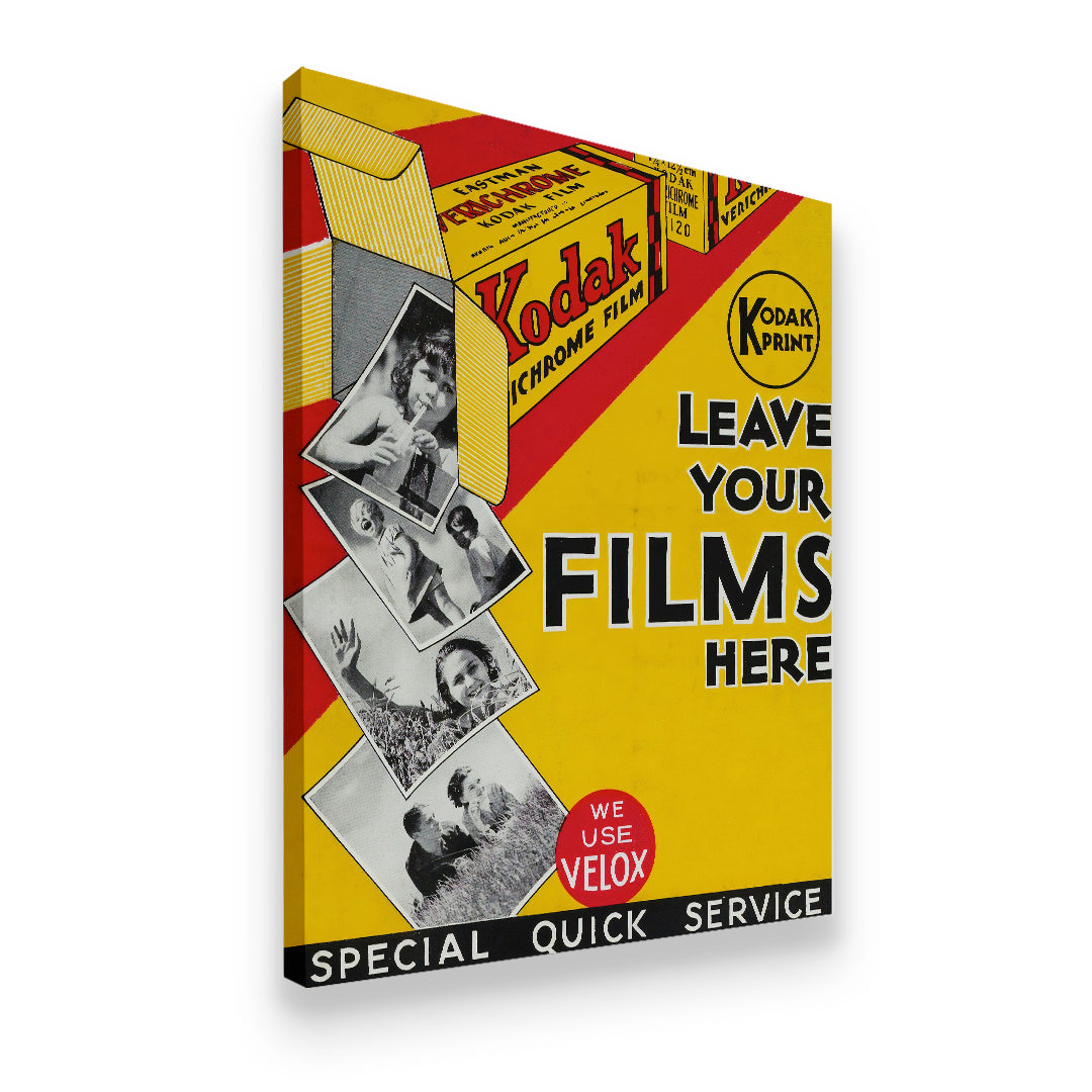 Gallery-wrapped Kodak Verichrome retro film ad canvas wall art shown at an angle, displaying vivid yellow, red, and bold typ