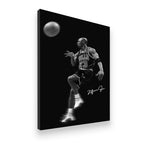 Michael Jordan No. 23 Chicago Bulls jump shot black and white canvas wall art — gallery-wrapped side angle