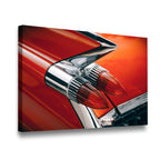 Gallery-wrapped canvas of a crimson classic car tail fin and chrome taillights, 1950s Cadillac-style retro wall art