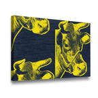 Side-angle view of yellow and navy pop art cow canvas wall art showing gallery-wrapped depth and texture