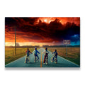 Stranger Things canvas wall art showing four kids on bikes facing the Welcome to Hawkins sign under a dramatic Upside Down s