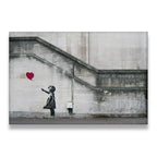 Girl with red heart balloon street art canvas wall art print – There Is Always Hope urban mural on concrete wall