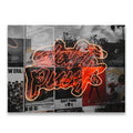 Daft Punk neon sign glowing in orange and red against a monochrome music poster collage, canvas wall art