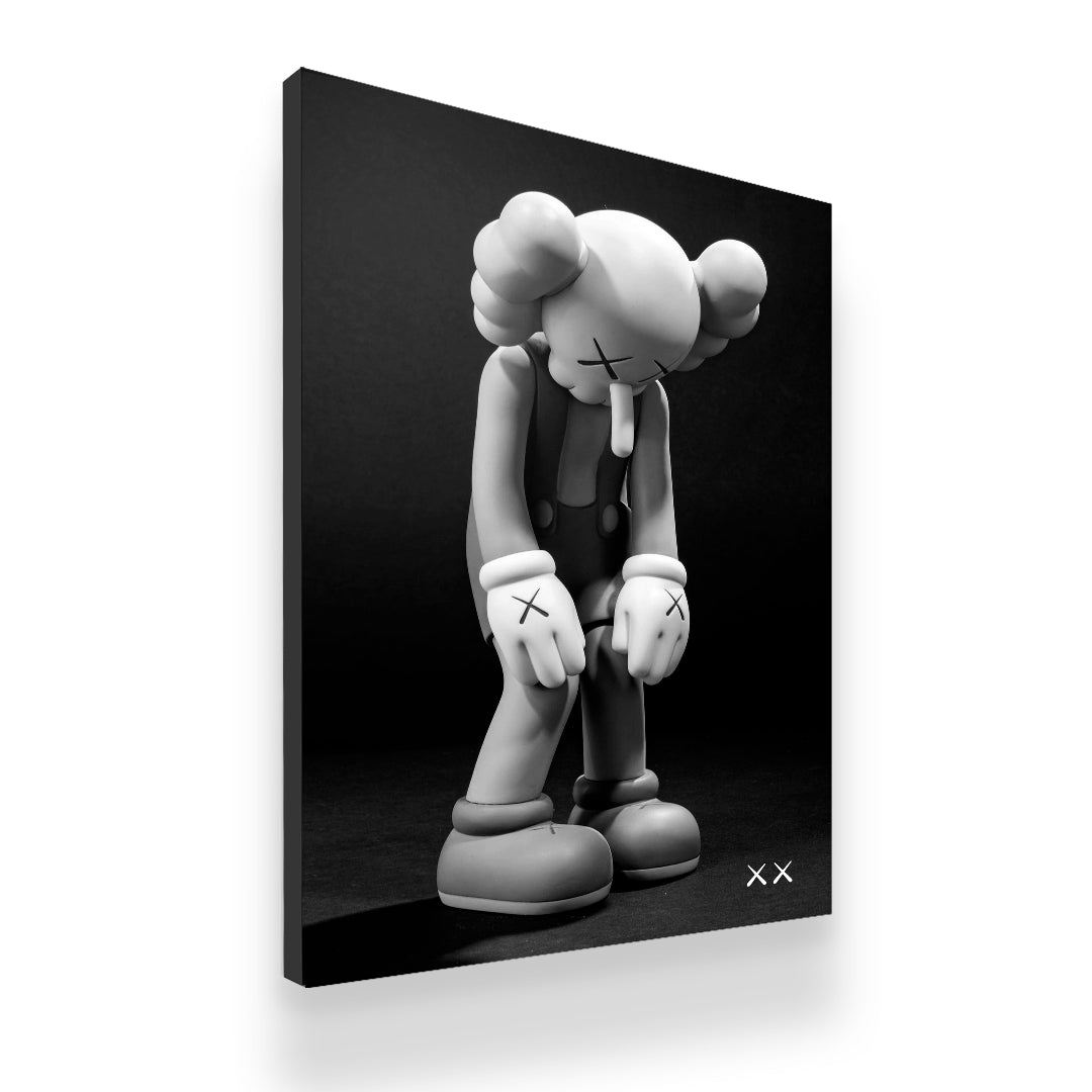 KAWS Companion brooding sculpture black and white gallery-wrapped canvas wall art side angle view