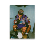Kobe Bryant sitting alone in locker room holding Lakers championship trophy wearing purple and gold jacket canvas wall art