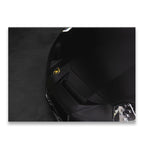 Close-up of a black Lamborghini hood with gold raging bull badge — dramatic overhead shot on dark canvas wall art