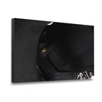 Gallery-wrapped canvas of a black Lamborghini supercar close-up with gold bull emblem, deep contrast archival print