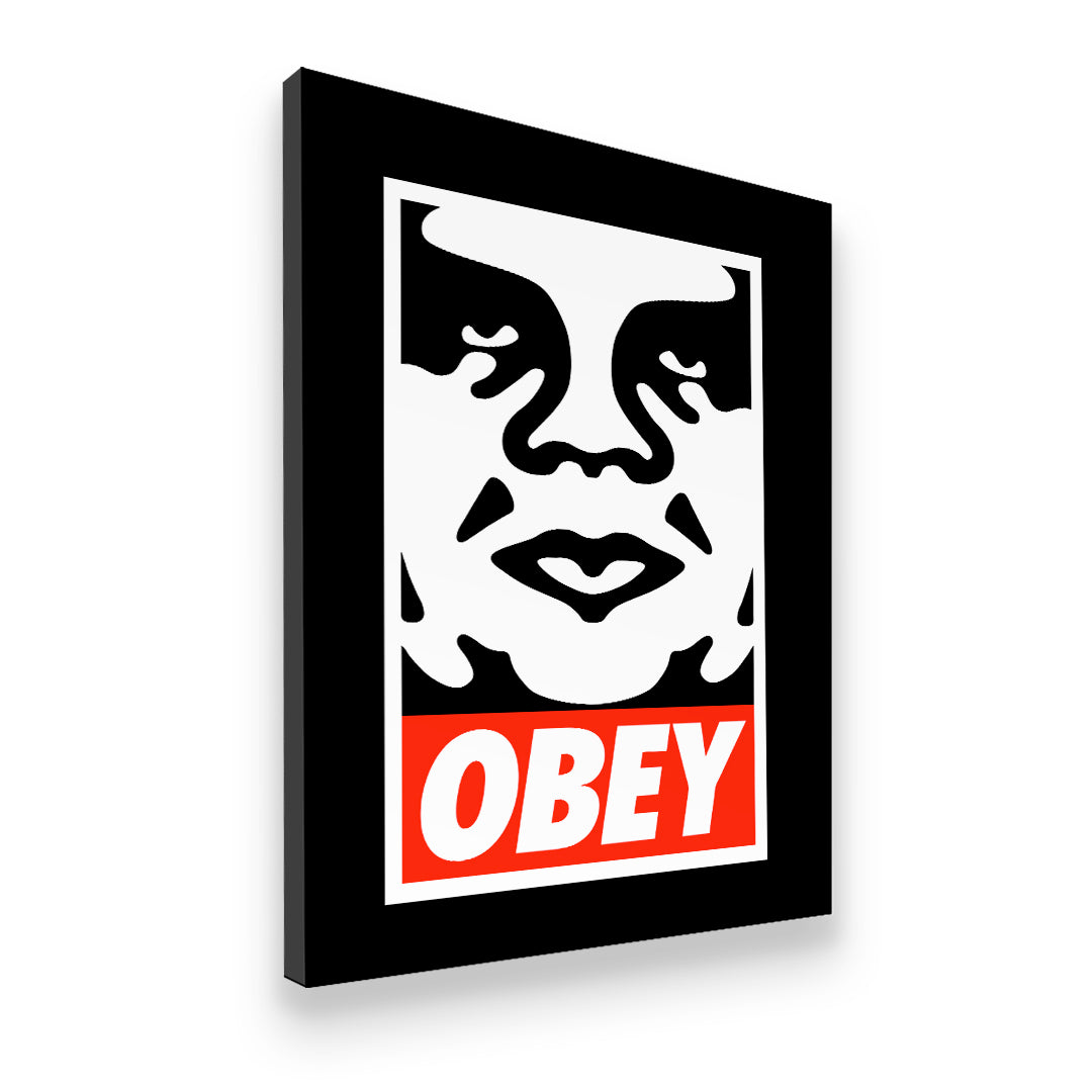 Gallery-wrapped Obey Giant street art canvas wall art angled view showing deep black border and red OBEY bar
