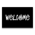 Black and white Welcome typography canvas wall art with bold swirl-accented hand-lettered text on black background