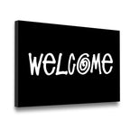 Welcome canvas wall art side angle view showing gallery-wrapped black canvas with white hand-lettered typography